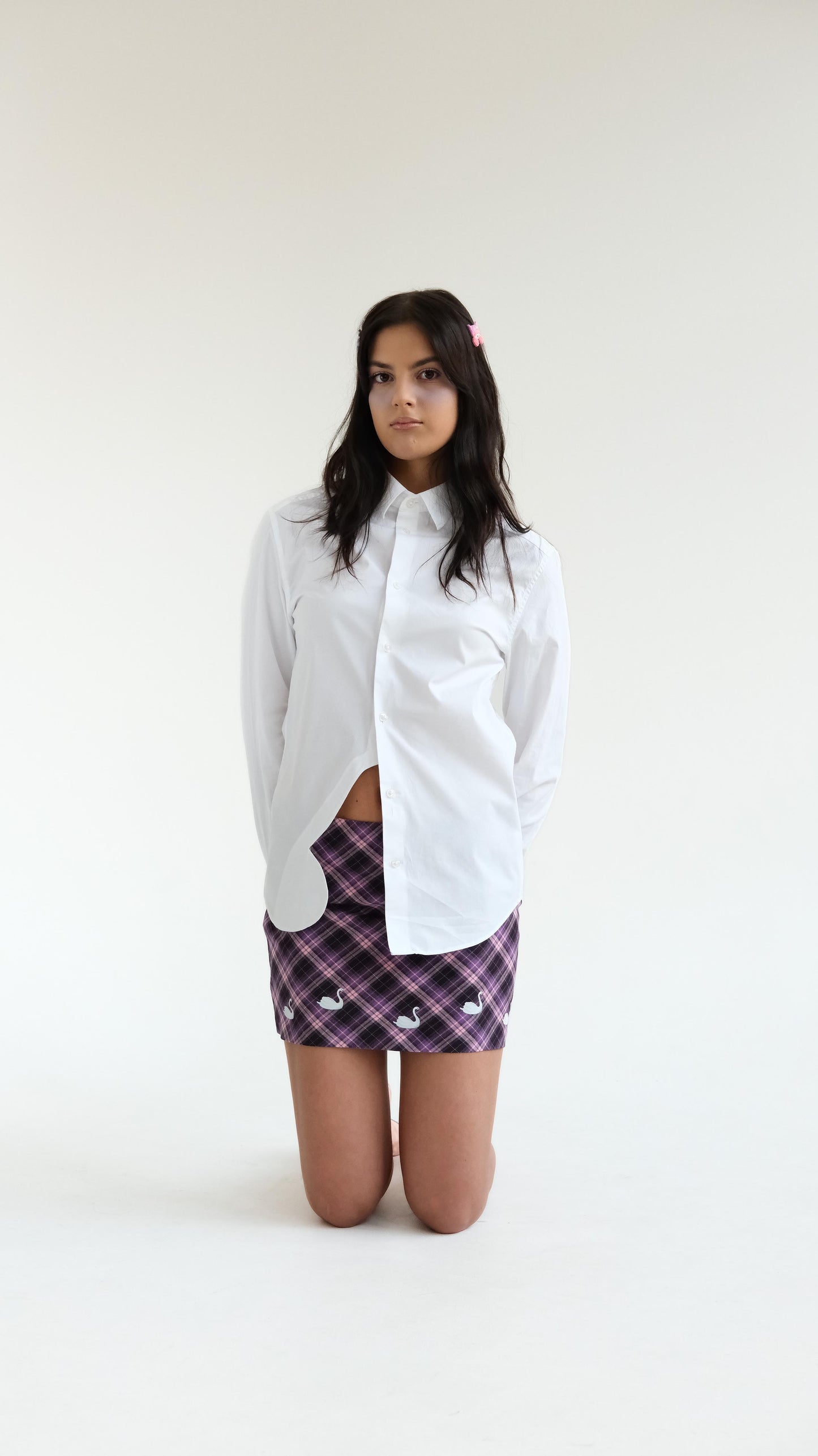 White shirt with a butterfly detail