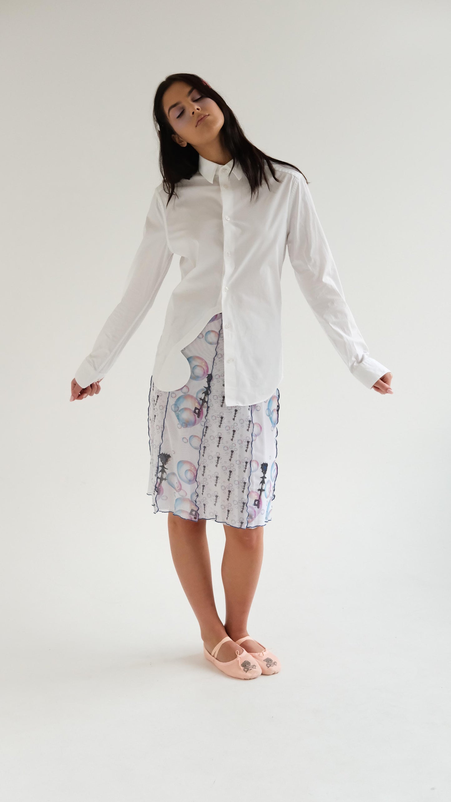 White shirt with a butterfly detail