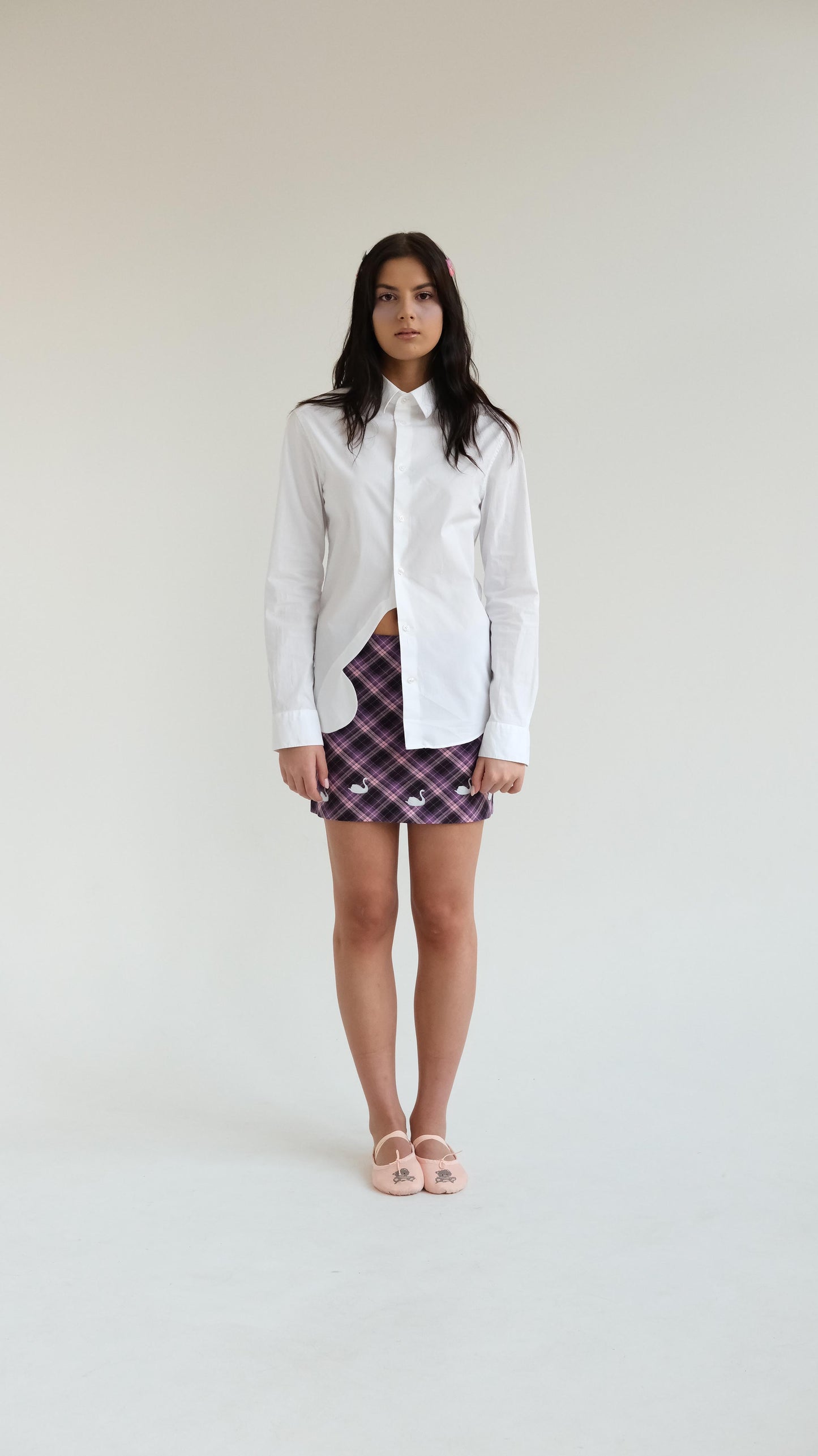 White shirt with a butterfly detail
